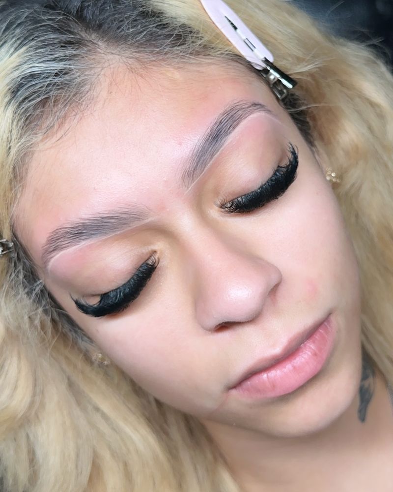 Wispy volume lashes on a blonde client